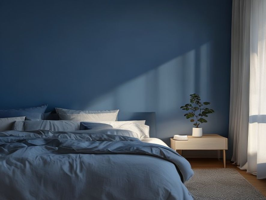 A calm bedroom setup with soft lighting and minimal clutter